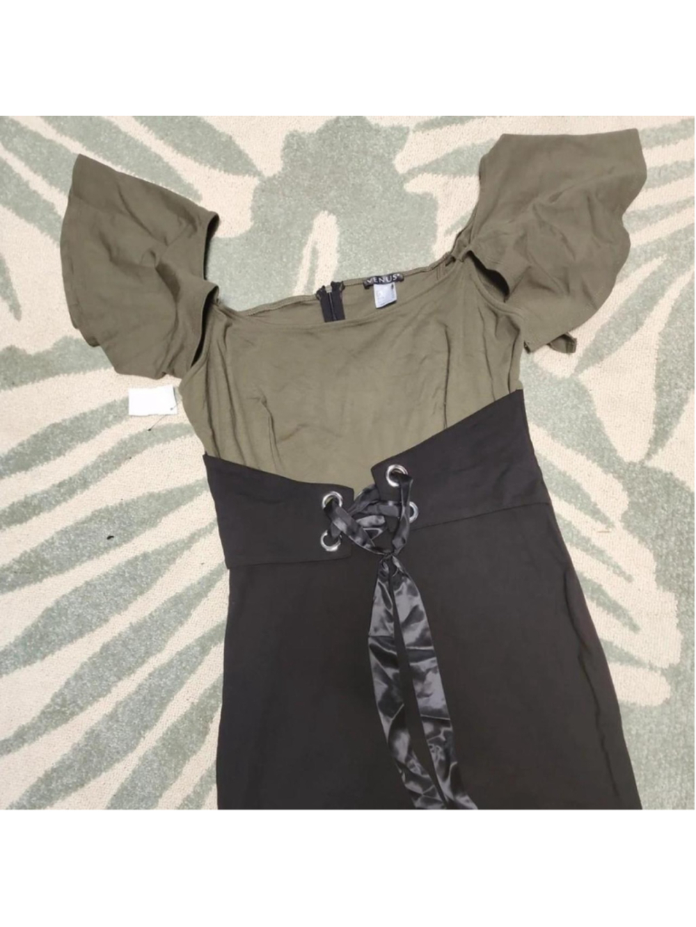 Venus olive green mini dress with black lace-up detail and puffy sleeves #party